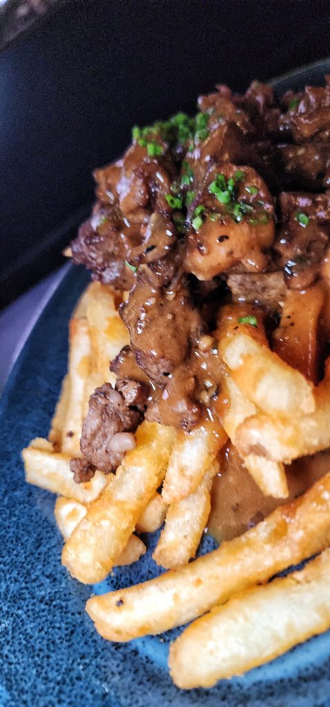 Barclays Center Gallagher Terrace Steak AU Poivre Loaded Fries upclose