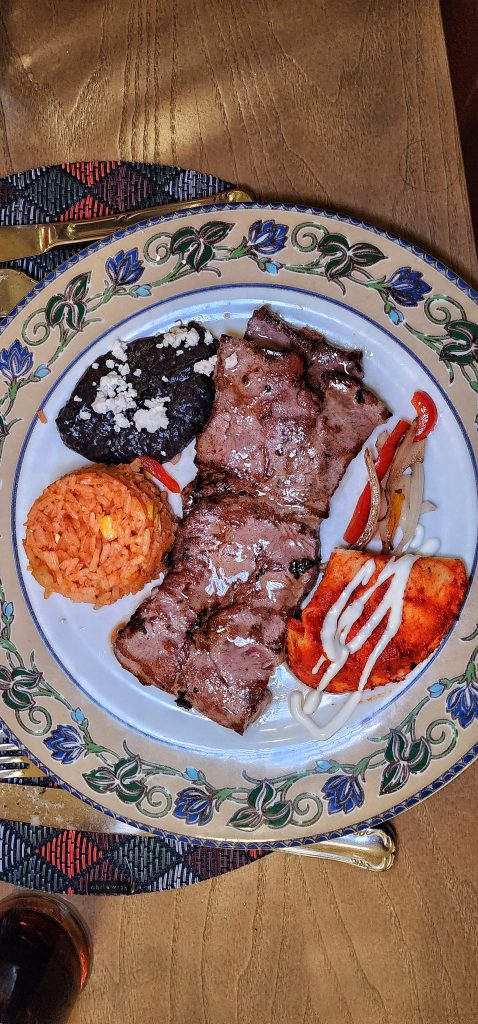 Hotel Riu Caribe Margarita steak with rice and bean top