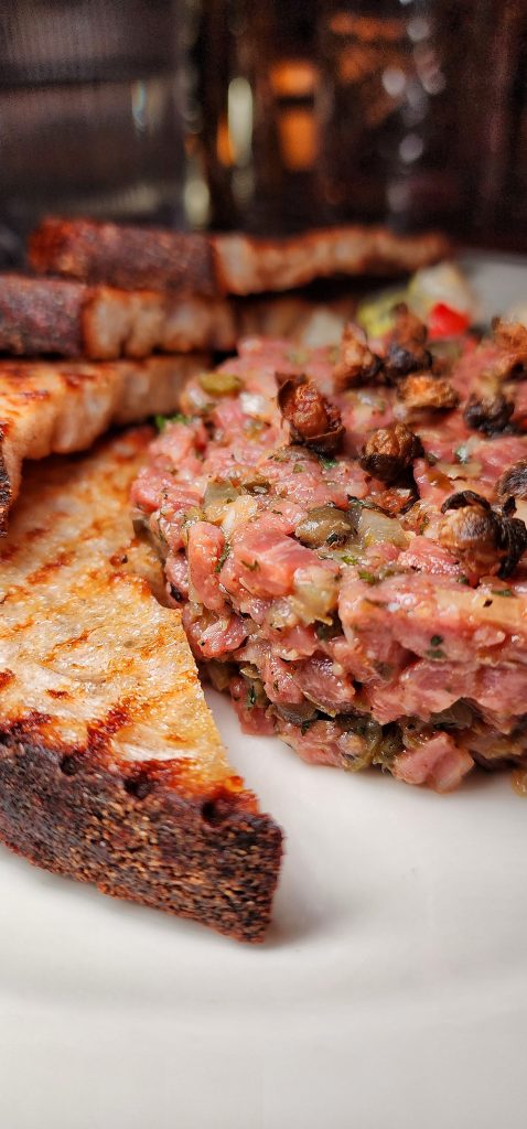 Golden Steer NYC Filet Mignon Tartare Top upclose with toast