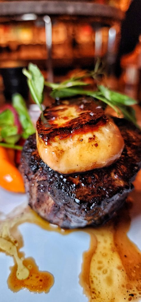 Carversteak nyc Filet Mignon with Seared Foie Gras cut up close