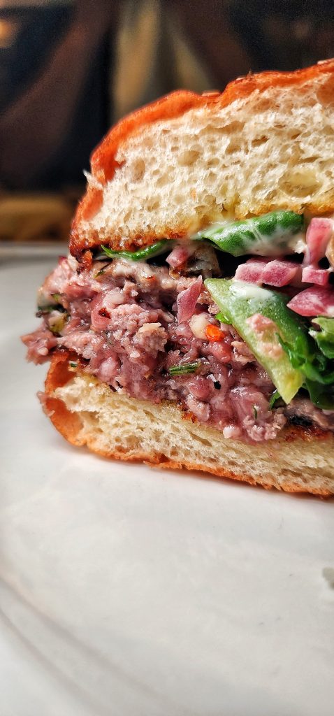 lamb burger special pickled onions cut